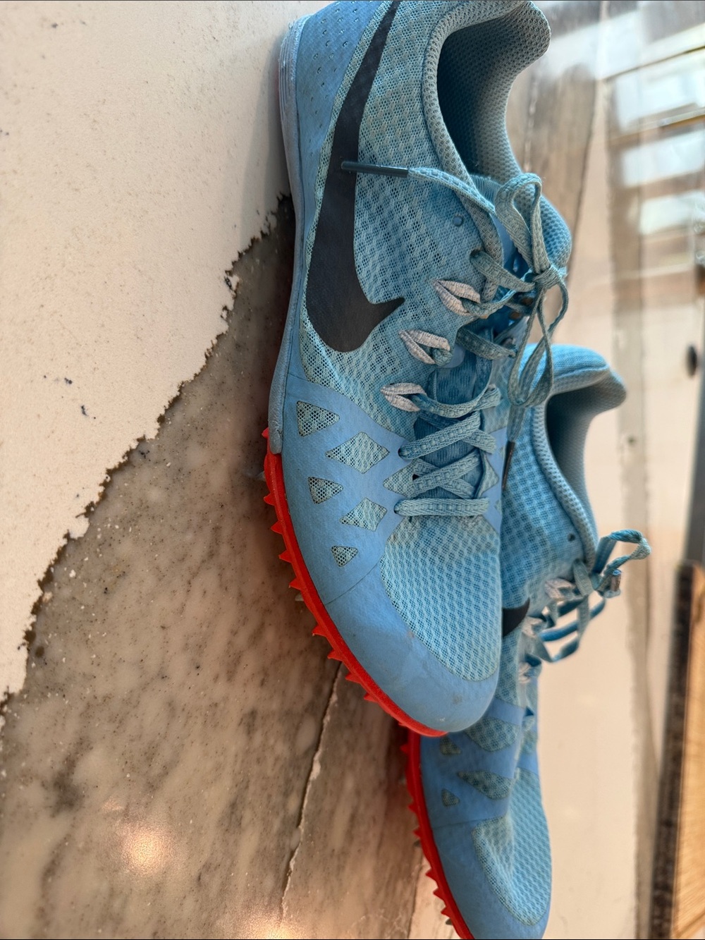 Nike Light Blue Running Spikes with Red Soles